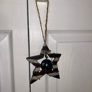 Two hand crafted Americana wooden star with bell ornaments 5”